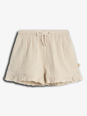 Cream-colored shorts with a drawstring waist and subtle floral pattern. The hem features ruffles, adding a decorative touch. The shorts are laid flat against a plain white background.
