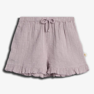 Lilac-colored textured shorts have a drawstring waistband, small floral patterns, and ruffled hems, displayed against a plain white background.