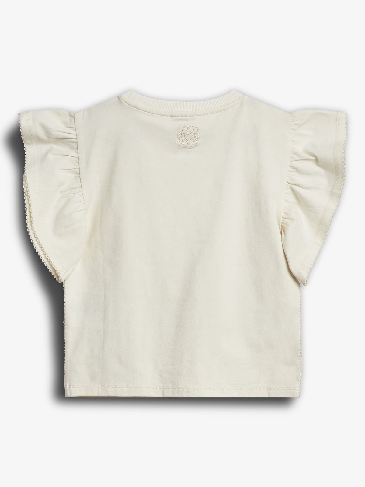 A white shirt with ruffled short sleeves is laid flat. The back features a small embroidered design near the neckline. The background is plain, enhancing focus on the shirt.