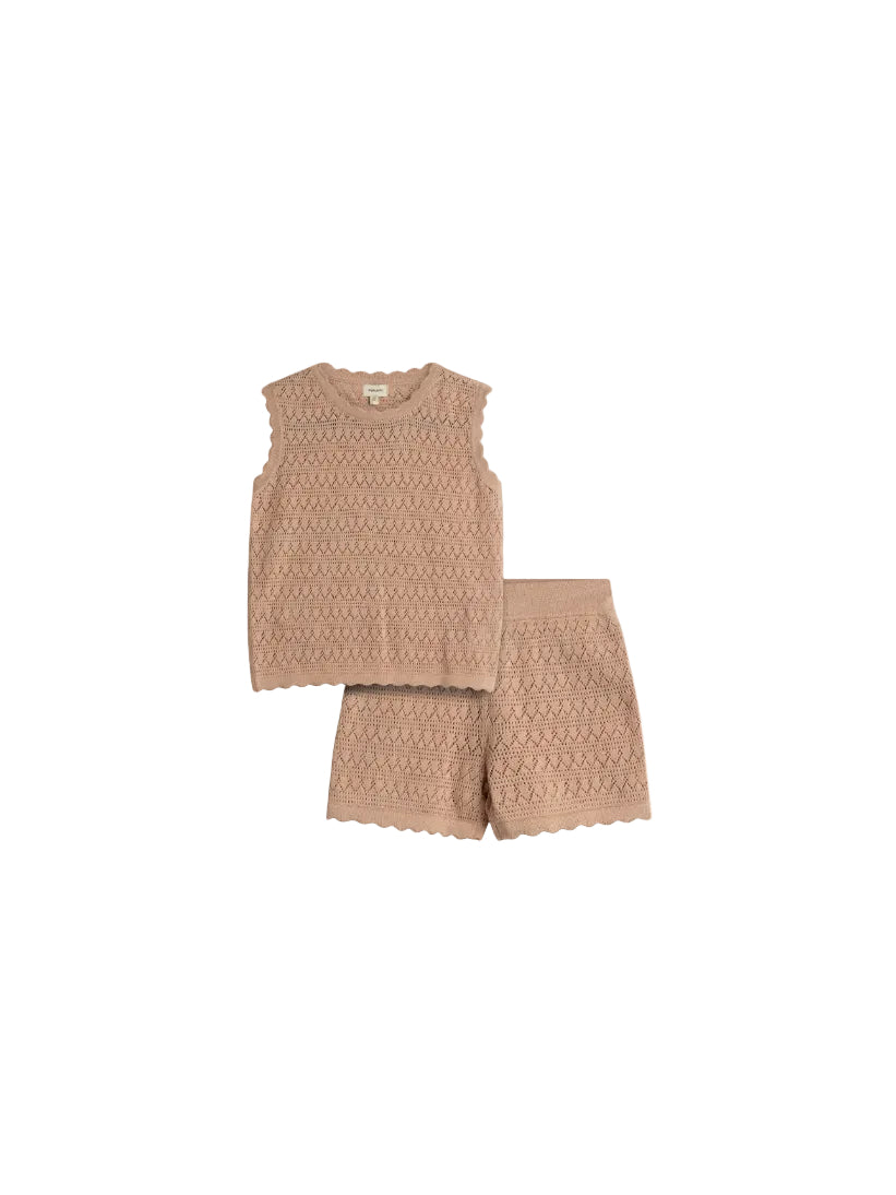 A knitted sleeveless top and shorts set in a beige color. The top features a diamond and zigzag pattern, alongside scalloped edges. It's laid on a plain light background.