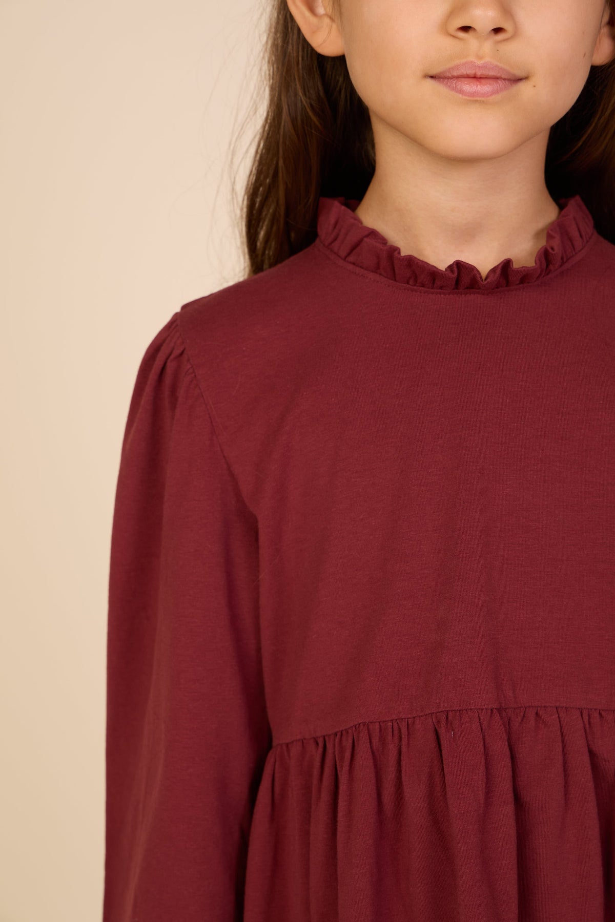 Ensfarvet jerseybluse med peplum Tween - Bordeaux | 101548 Heidi