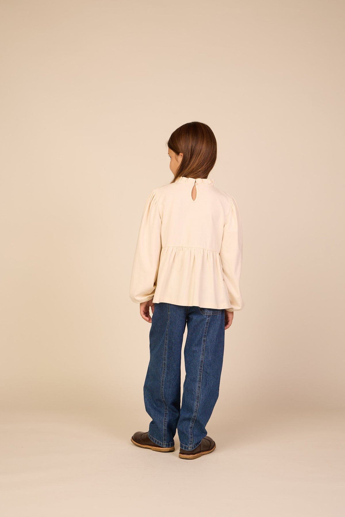 Ensfarvet jerseybluse med peplum Tween - Offwhite | 101546 Heidi