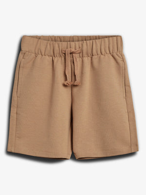 Tan shorts with elastic waistband and drawstring, featuring two side pockets, displayed on a plain white background.