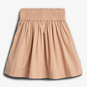 Beige skirt with a gathered, elastic waistband drapes gently, forming soft pleats. It is centered against a plain white background, highlighting its simple and elegant design.