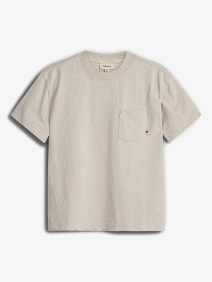 Beige short-sleeve T-shirt with a small front pocket, featuring a subtle logo. The tag reads "mini olie, 10". Set against a plain white background.