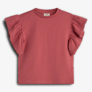 Pink ruffled sleeveless t-shirt hangs against a white background. The garment features soft fabric, ruffled sleeves, and subtle stitching detailing along the edges.