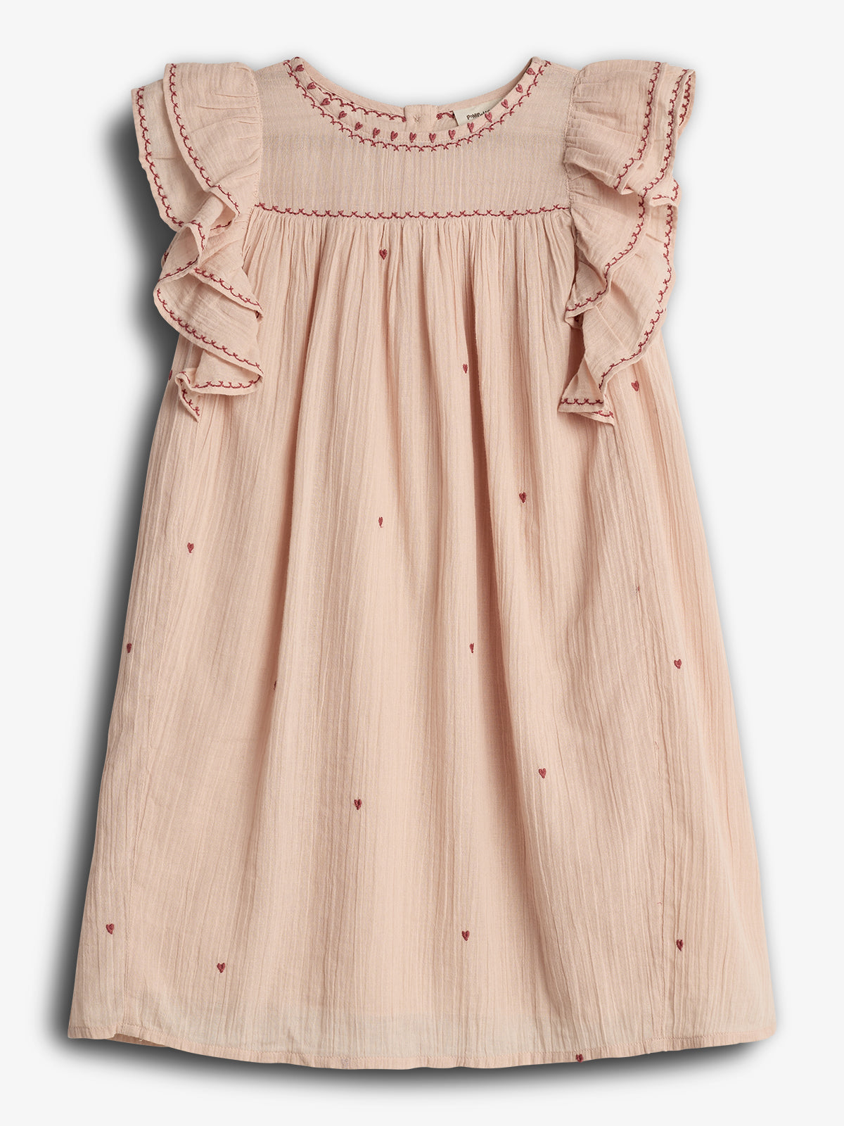 A light pink dress features red embroidered hearts and ruffled sleeves, with intricate stitching along the neckline and sleeves. The garment is displayed on a plain, light background.