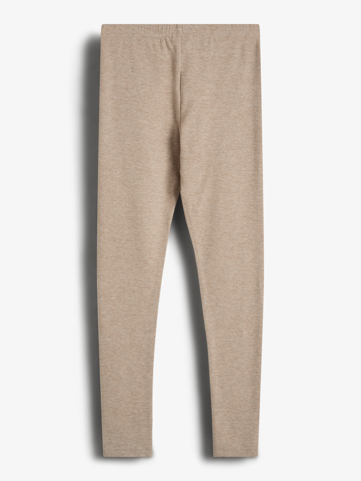 Beige leggings hænger fladt, uden synlig bevægelse, mod en hvid baggrund.