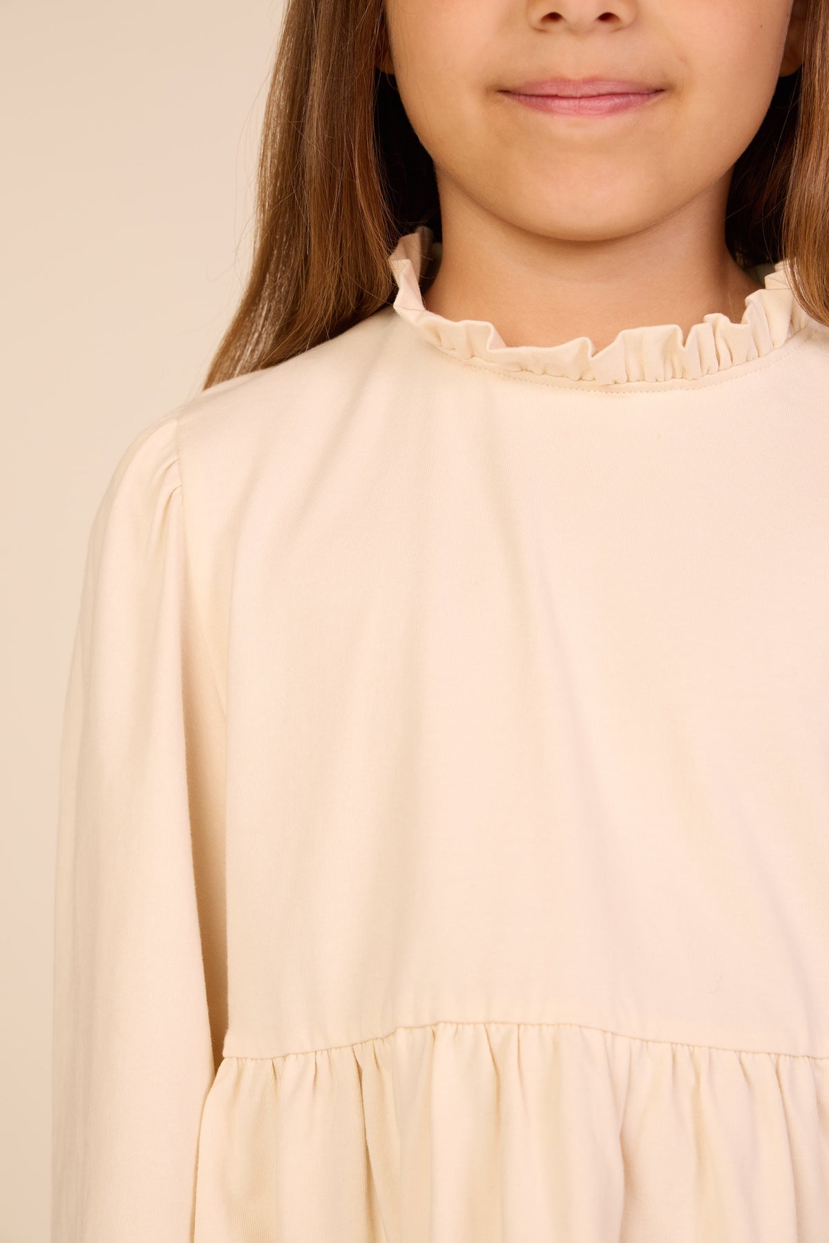 Ensfarvet jerseybluse med peplum Tween - Offwhite | 101546 Heidi